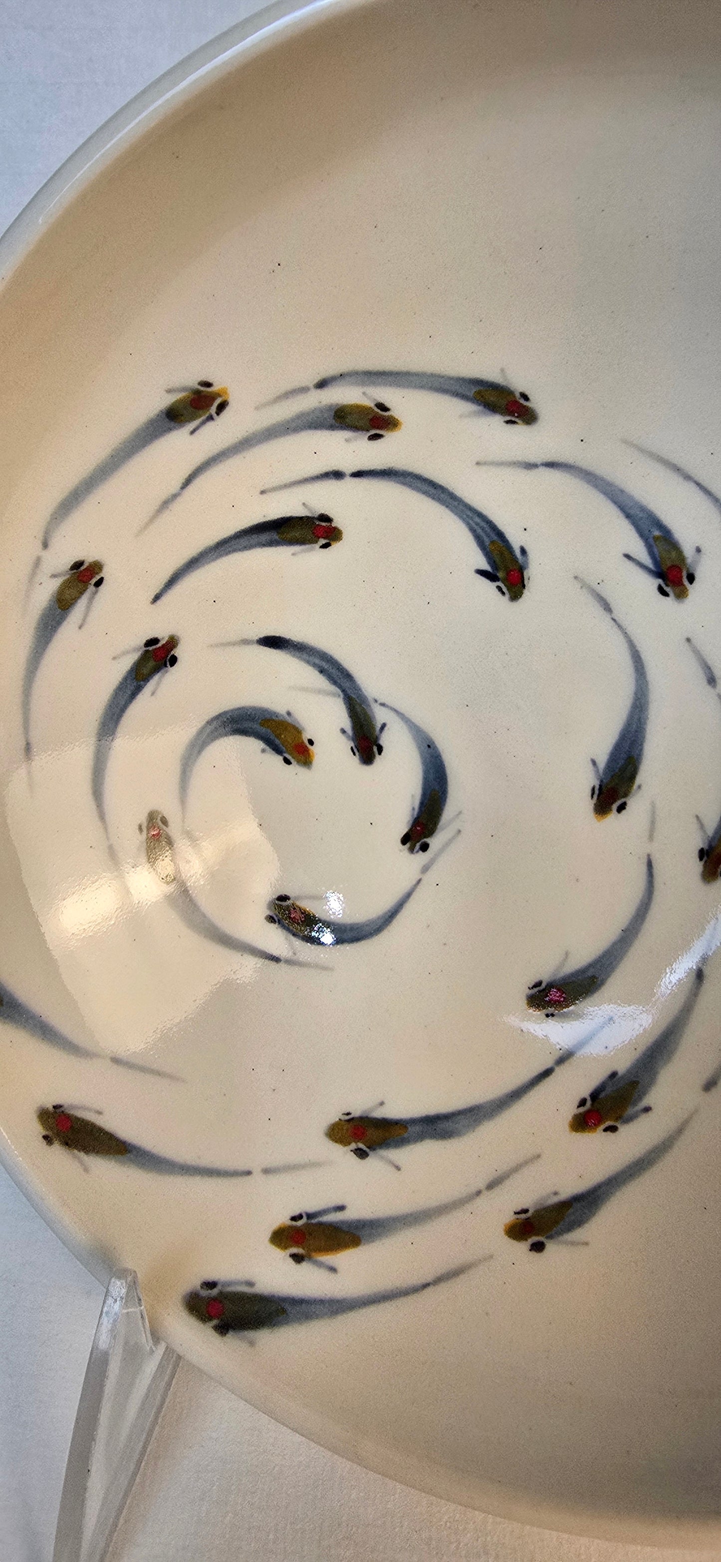 Stoneware Bowl – Hand-Painted Swirling Fish Design